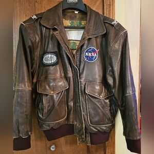 Authentic Aviator leather jacket,  size is medium to large, with patches